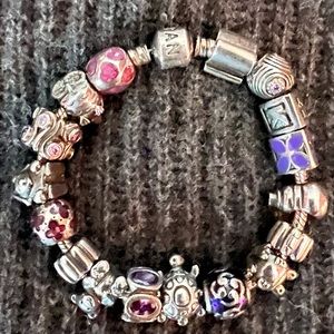 Authentic Pandora bracelet and charms! Size 7.1